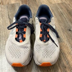 Gray and Orange Athletic Shoes
